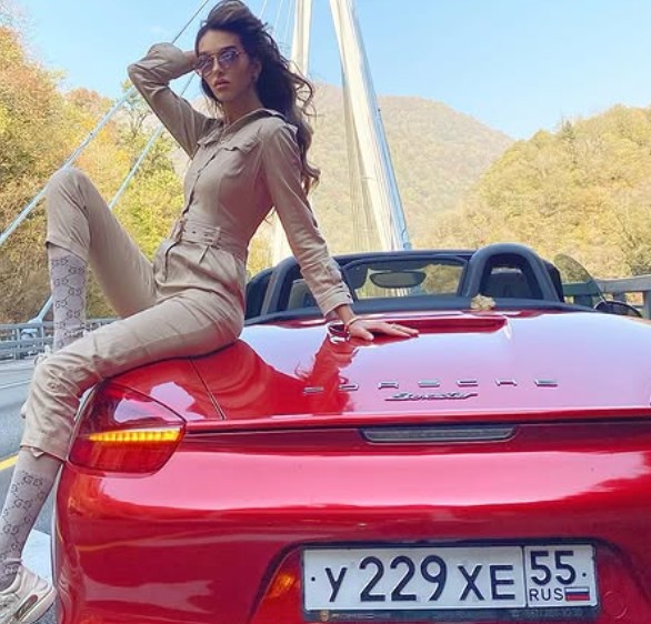 Oksana Voevodina with her Porche