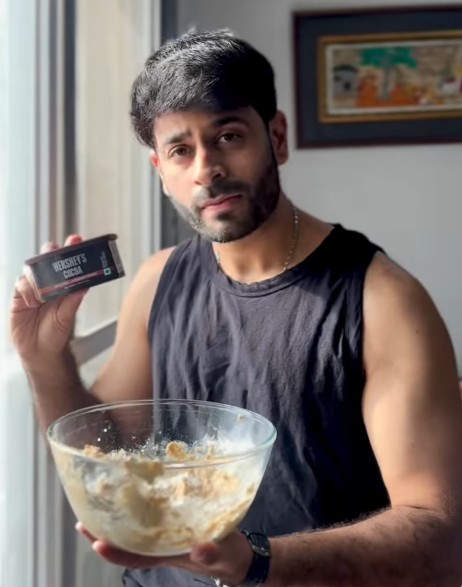 Teja Kalvakota while baking biscuits