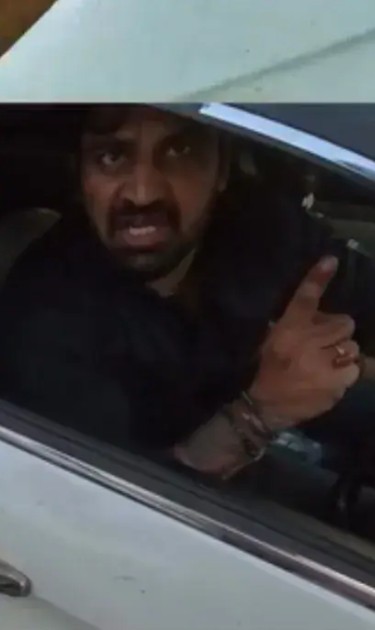 A picture of Kalyan Bainsla while yelling at the biker on Golf Course Road in Gurugram, Haryana