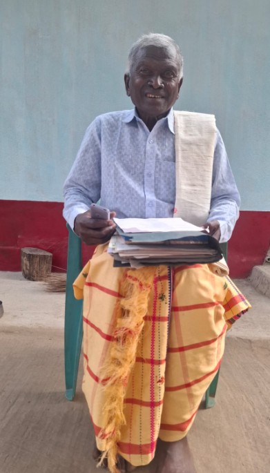 Charan Hembram during a teaching session at a school