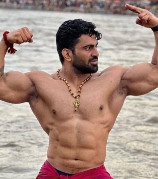 Kalyan Bainsla while showing his boy