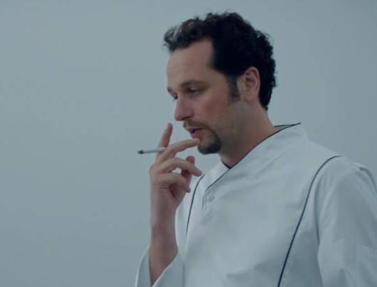 Matthew Rhys while smoking a cigarette