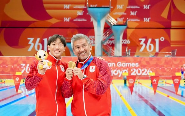 Shin Ohashi with his coach