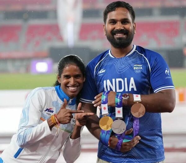 Vithya Ramraj with her coach Nehpal Singh Rathore
