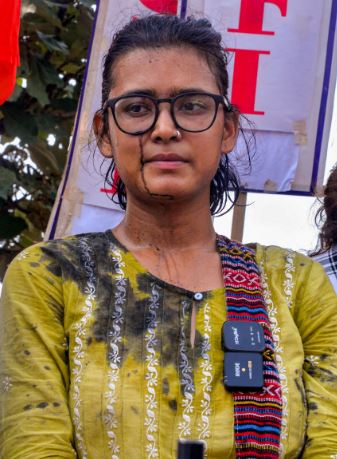 A picture of Neha Bora from 2026 Jharkhand student protests when an unidentified man allegedly threw ink at her