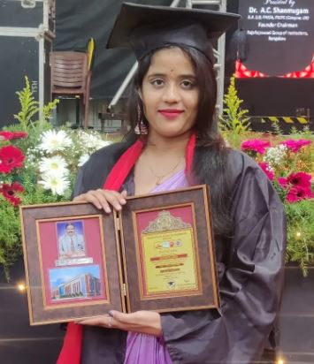 Lakshmi Gowda with her graduation degree