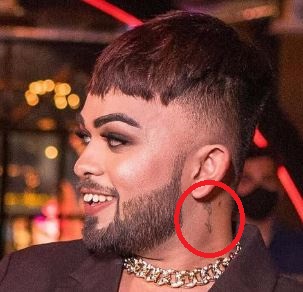 Mad Sandhu's neck tattoo