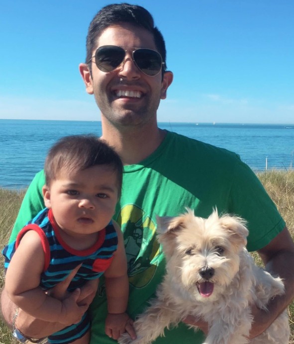 Ranjeev Puri with his pet dog and a child